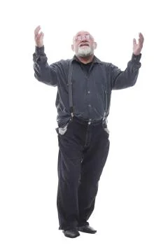 Frustrated elderly man with empty pockets. isolated on a white Fotos Stock