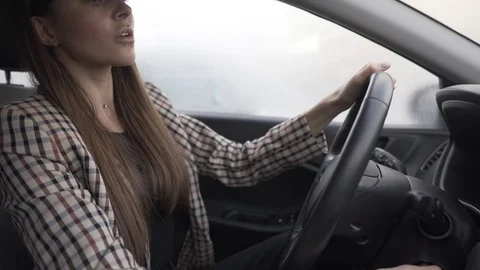 Frustrated Female Driver In A Car And The Engine Won't Start Stock Footage