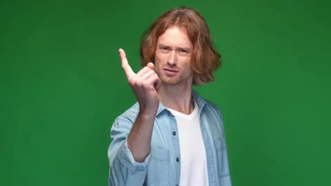 Frustrated guy ask be quiet speechless isolated vivid color background Stock Footage 169515872