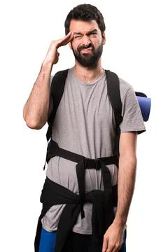 Frustrated handsome backpacker on white background Stock Photos
