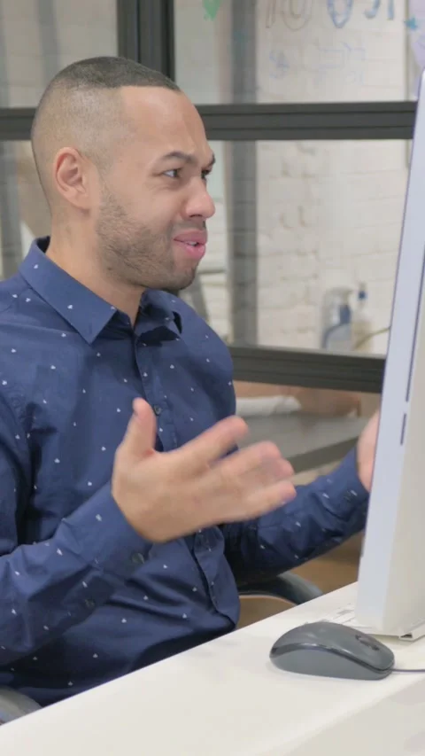 Frustrated Hispanic Businessman Trying to Work on Computer, Anger, vertical Stock Footage 325701345