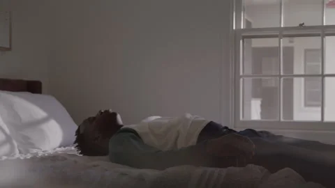 Frustrated Husband Falls Back On Bed Stock Footage 270295145