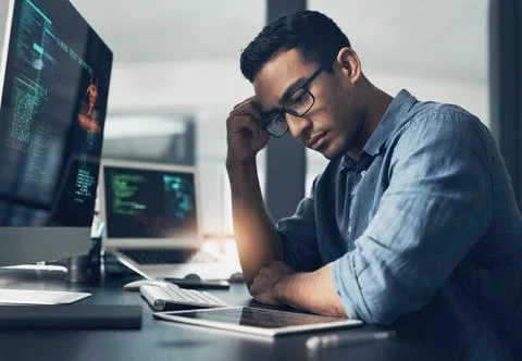 Frustrated, man and cyber attack with computer for virus, theft or cybersecurity 库存照片