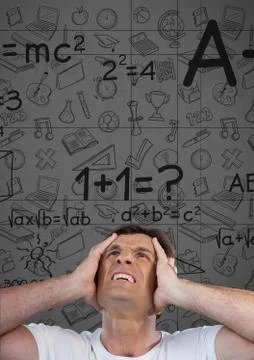 Frustrated man with math background Stock Photos