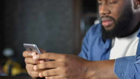 Frustrated man reading rejection message sitting in pub, problems with job 스톡 동영상 104930401