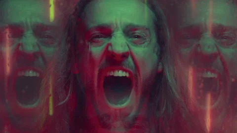 Frustrated Man Screaming in Rage in Studio with Neon Illumination Stock Footage 255308005