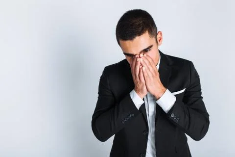 Frustrated man in Studio on white background, isolated, business style, styli Stock Photos