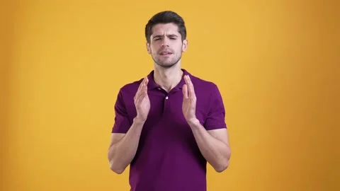 Frustrated man touch temples forehead headache isolated shine color background Video stock 187232677