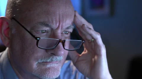 Frustrated older man at computer, close up Stock Footage 36040512