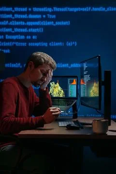 Frustrated overworked programmer suffering from coding stress and fatigue Stock Photos