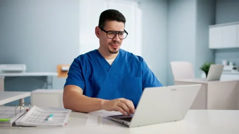 Frustrated Overworked Sad Doctor At Computer Stock Footage 327503016