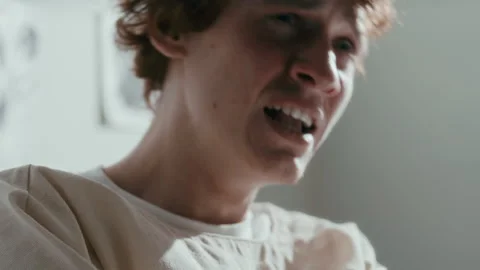 Frustrated Patient in Straitjacket Screaming during Emotional Breakdown Stock Footage 313251811