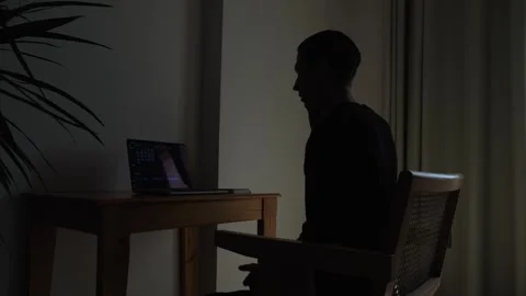 Frustrated professional arguing during a work call and pointing at laptop during Stockbeeldmateriaal 346250450