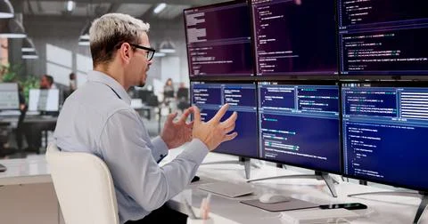 Frustrated Programmer Struggling With Complex Web Development At Office Desk Stock-Fotos
