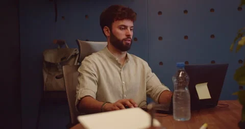 Frustrated programmer testing the code that does not work for a hundredth time Stock Footage 269071389