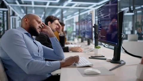 Frustrated Software Developers And Engineers Struggle With Broken Code While  Stock Photos