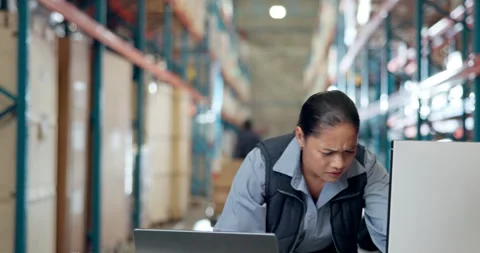 Frustrated woman, computer or operator with stress in warehouse for overworked Vídeo Stock 318230271