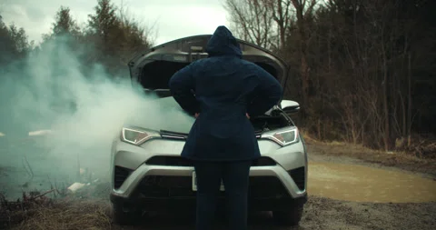 Frustrated Woman Inspecting Smoke Coming from Broken Car Engine. Vehicle Видео 237607053