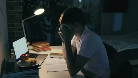 Frustrated young man throws his pen giving up on the academic home study. Stock Footage 345212046