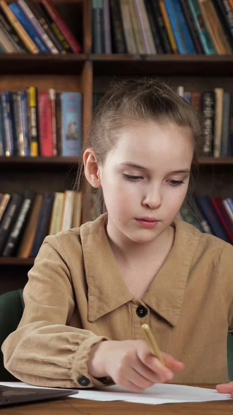 Frustrated young student crumpling up a paper with a failed drawing or test Stock Footage 341444064