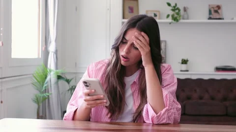 Frustrated Young Woman Experiences a Problem While Stock Footage 334015534