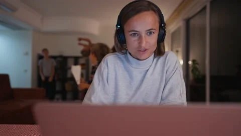 Frustreted caucasian mom trying to work with little kid at home. Stock Footage 224930348