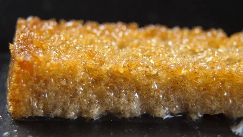 Fry bread slice in oil, closeup. boiling oil while frying bread Stock Footage 88070936