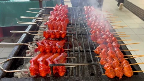 Fry chicken, fish ball open night food market in Brunei Stock Footage 235571815