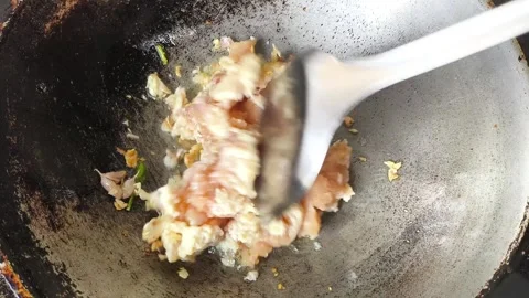 Fry chopped chicken Stock Footage 337101894