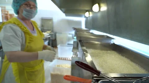 Fry the dough in a deep fryer Stock Footage 221818070