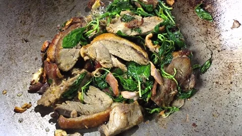 Fry duck basil2 Stock Footage 321118476