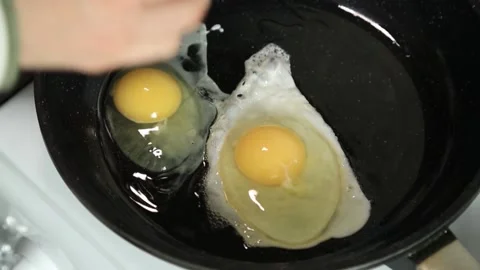 FRY EGGS Stock Footage 155653404