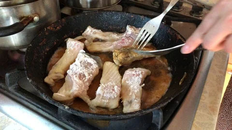 Fry fish in a pan Stock Footage 116467746