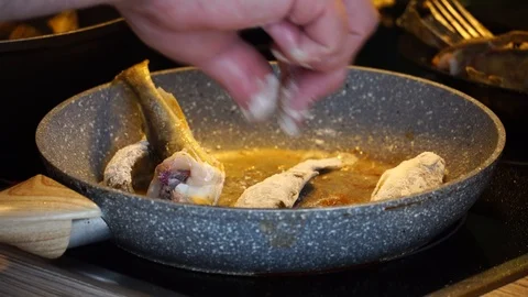 Fry fish in a pan Stock Footage 125009545