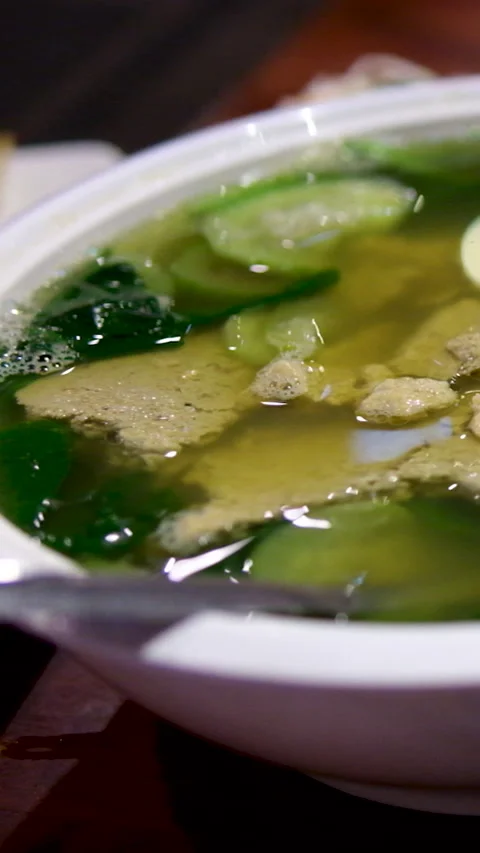 Fry fish with vegetables Fried crispy crucian carps.Preparing Fish in Frying Pan Stock Footage 314498499