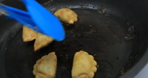 Fry in a frying pan Stock Footage 145502690