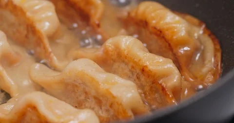 Fry Meat dumpling in pan Stock Footage 112268351