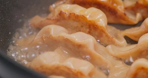 Fry Meat dumpling on pan Stock Footage 112360451