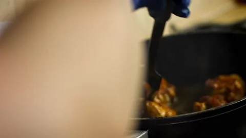 Fry the meat for a good crust. 4k video Stock Footage 157183410