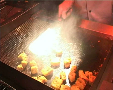 Fry meat on kitchen flag Stock Footage 655506