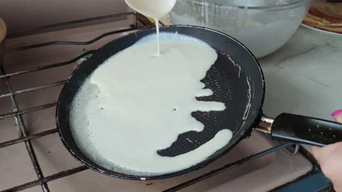 Fry pancakes in a pan Stock Footage 201933394