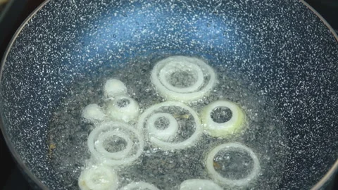 Fry pepper slices in a pan Stock Footage 115077313