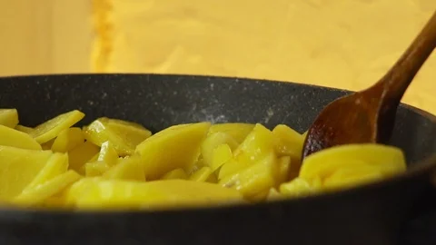 Fry potatoes in a pan Stock Footage 99019980
