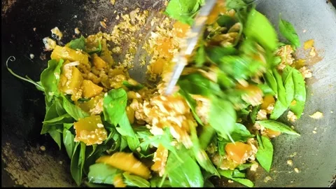 Fry pumpkin egg and Lemon basil Stock Footage 342019611