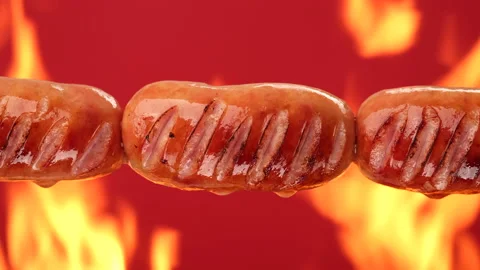 Fry sausages on open fire Video stock 195436366