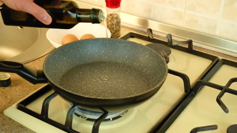 Fry scrambled eggs in a pan. selective focus. Stock Footage 149852050