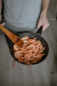 Fry seafood in a pan Stock Photos