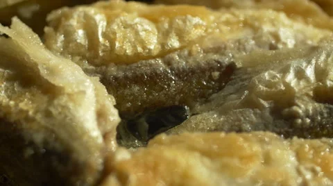 Fry small fish in a frying pan Stock Footage 61563451