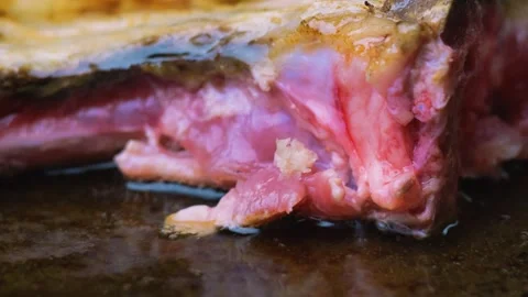Fry the steak in a frying pan Stock Footage 247578049