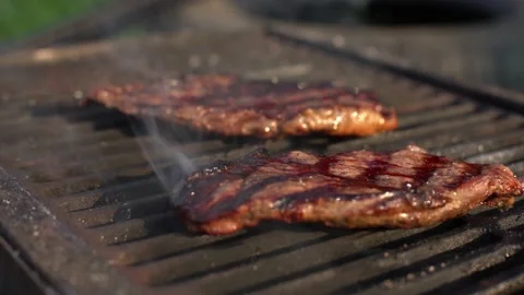 Fry the steak. Juicy appetizing steak. Grilled meat.Beautiful BBQ Delicious meat Stock Footage 137855846